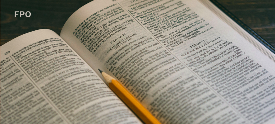 A pencil sitting on a Bible